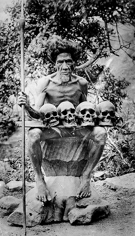 IFUGAO HEAD HUNTER WITH FOUR HUMAN TROPHY SKULLS DAVID HOWARD TRIBAL ART THE LAST FILIPINO HEADHUNTERS